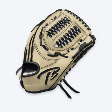 Side view of the Tater Mod. Trap Loop pitcher's glove showing the blonde trap loop web with black lacing and TB logo on the wrist strap