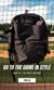 Minimalistic baseball coaches back pack hanging from fence. 