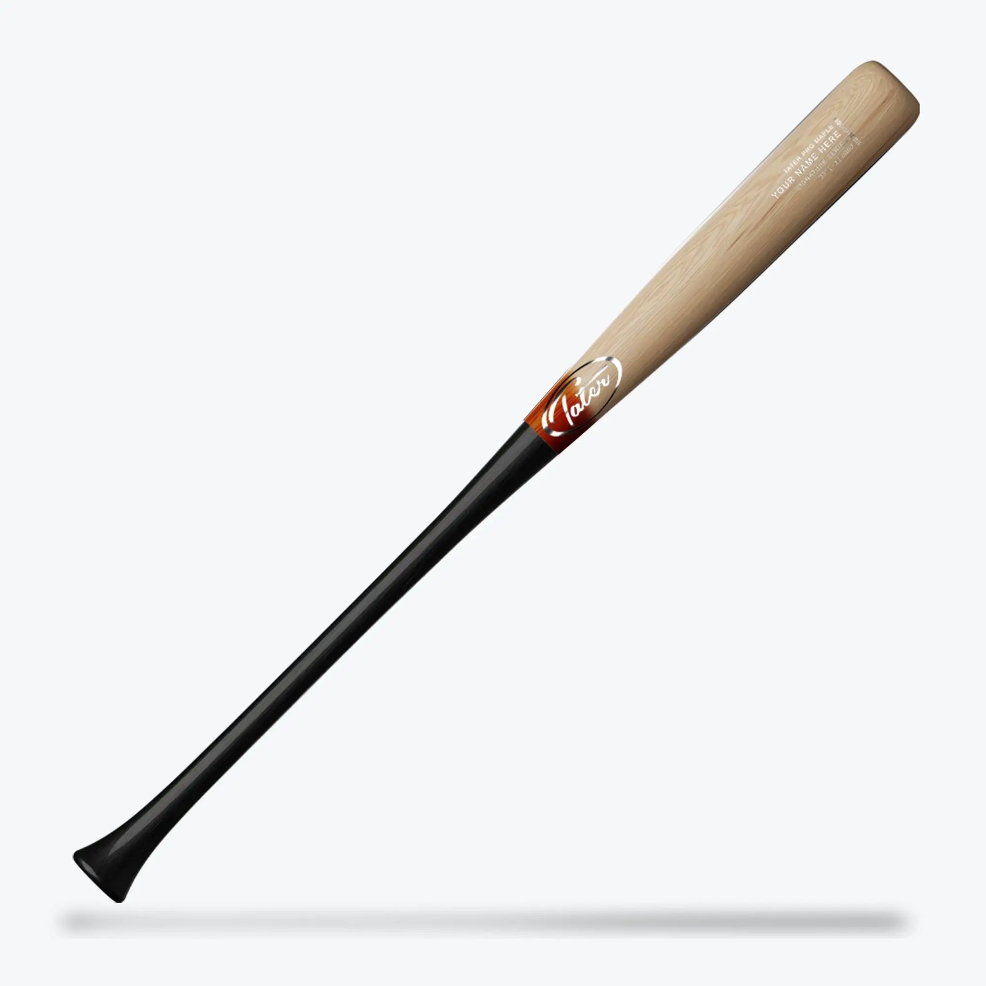 Pictured is a Tater J21 custom wood bat, a knobless design to reduce the risk of hamate bone injuries, with a natural wood finish on the barrel that contrasts with a sleek black handle. The bat's drop-3 weight makes it a solid choice for players seeking both safety and performance customization.