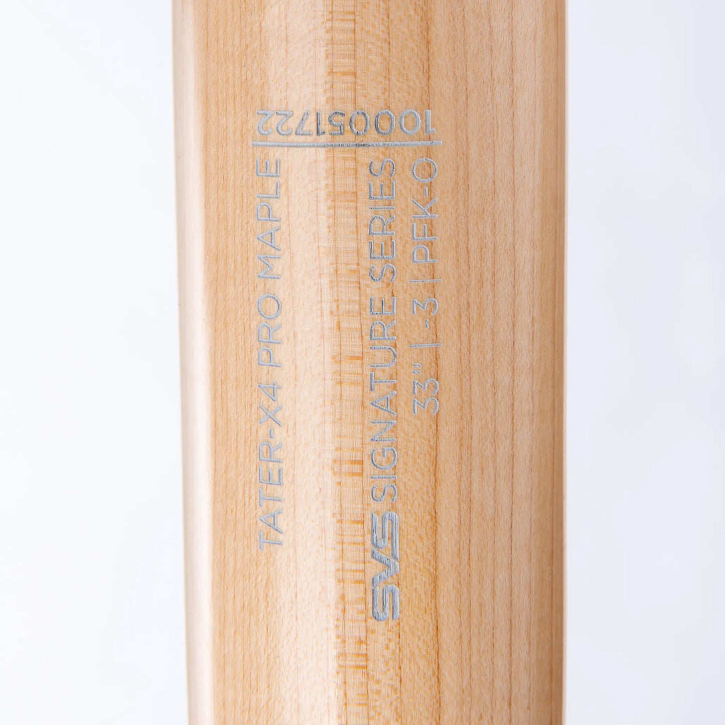 Close-up view of Tater Baseball's custom engraving on a maple wood bat, featuring the Tater-X4 Pro Maple and the SVS Signature Series logo with model number.