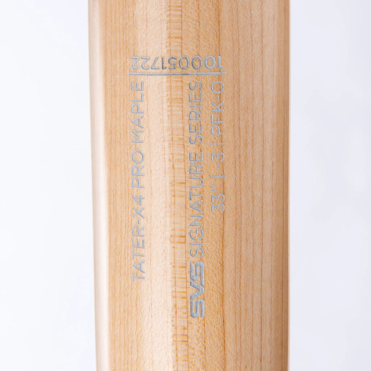 Close-up view of Tater Baseball&#39;s custom engraving on a maple wood bat, featuring the Tater-X4 Pro Maple and the SVS Signature Series logo with model number.