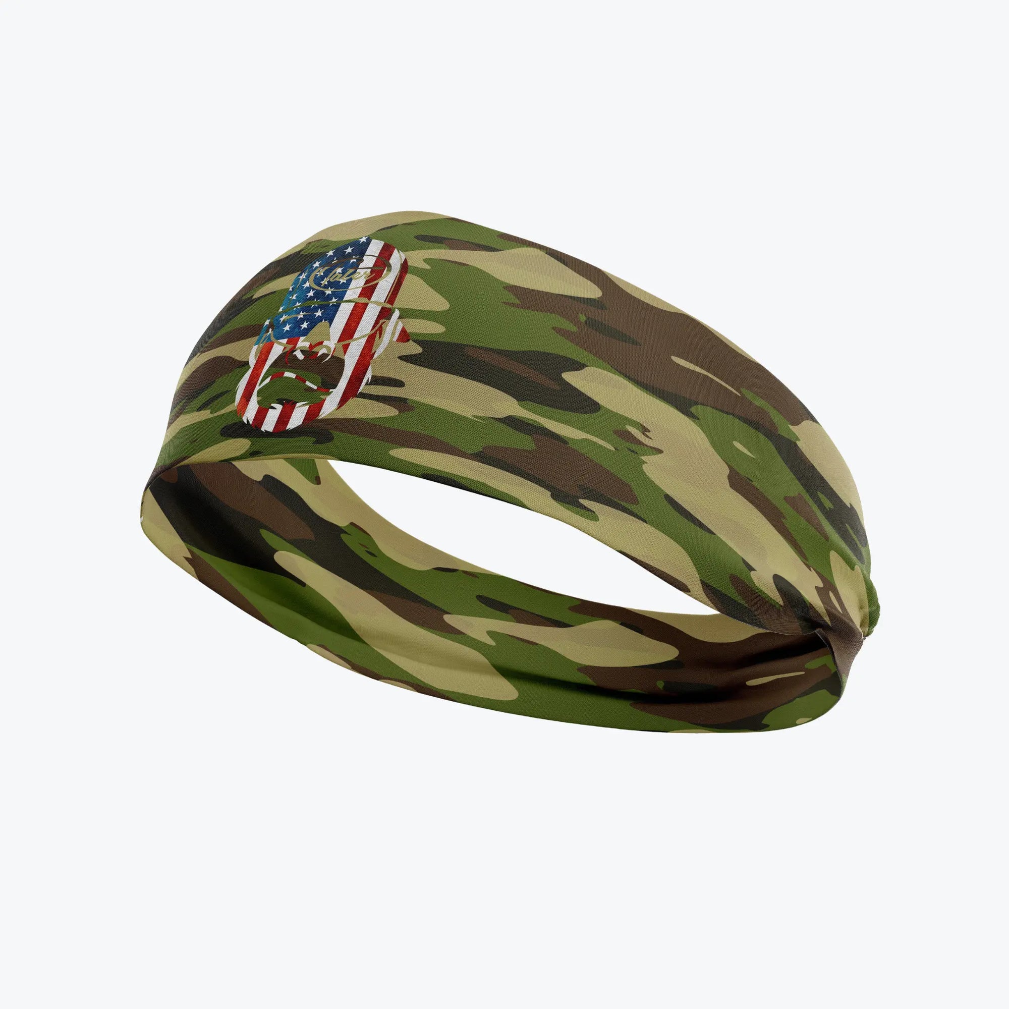 Camo-patterned moisture-wicking headband designed for baseball workouts, featuring a patriotic USA flag patch, combining functionality with a tribute to American spirit by Tater Baseball.